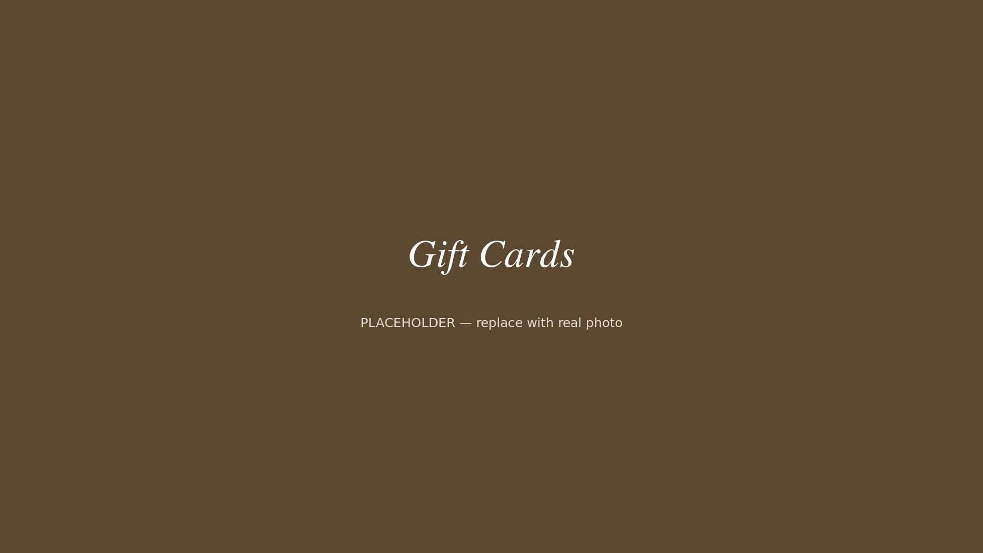 An elegant gift card presentation on a linen tablecloth